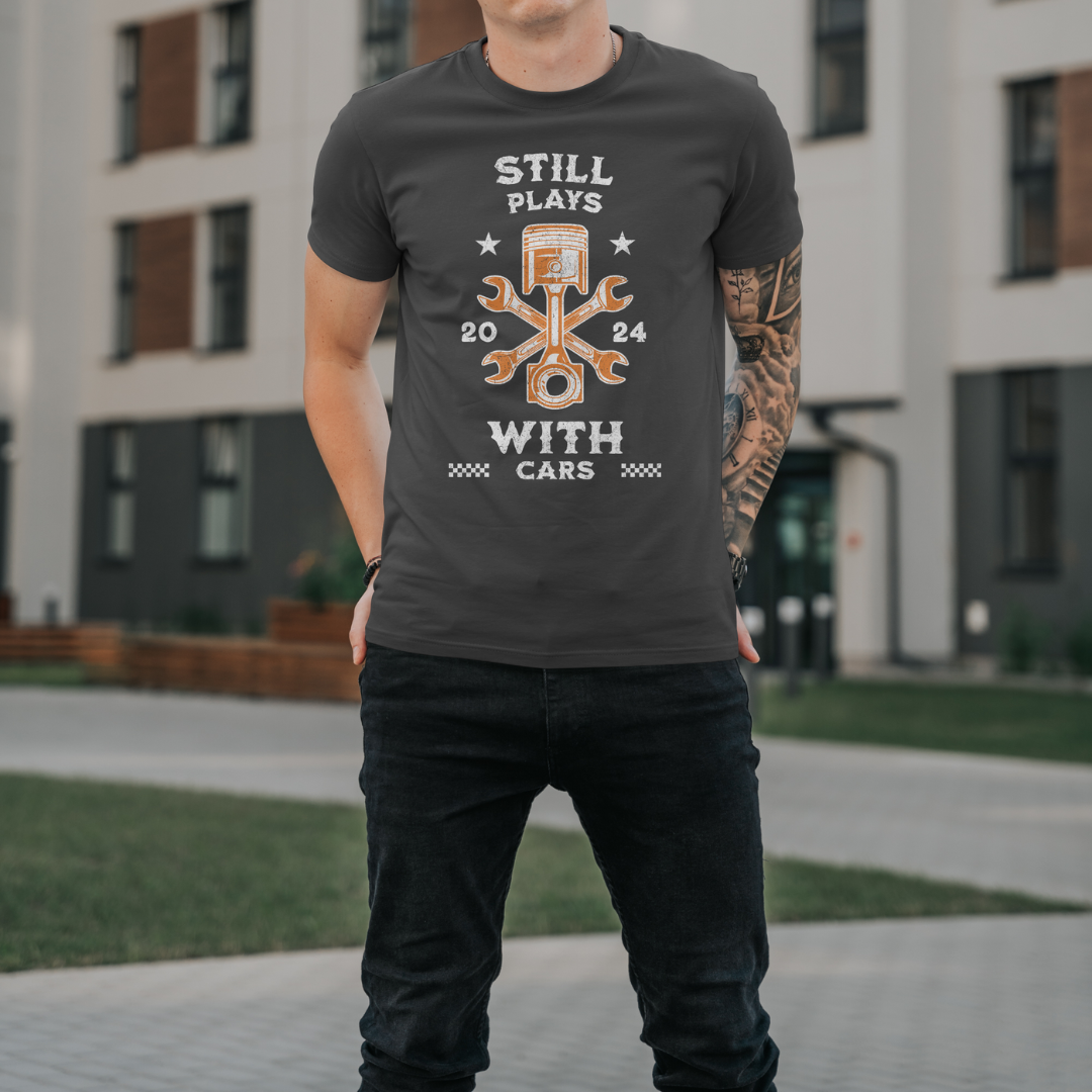 "Still Plays With Cars" T-shirt